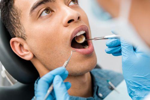 man getting dental exam