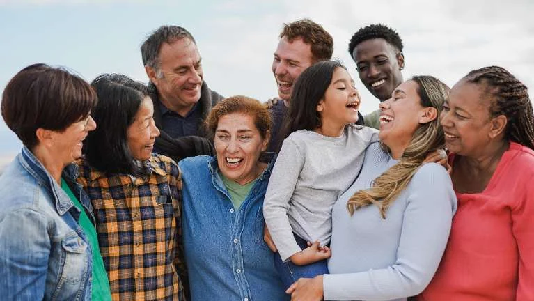 Large multigenerational family smiling together